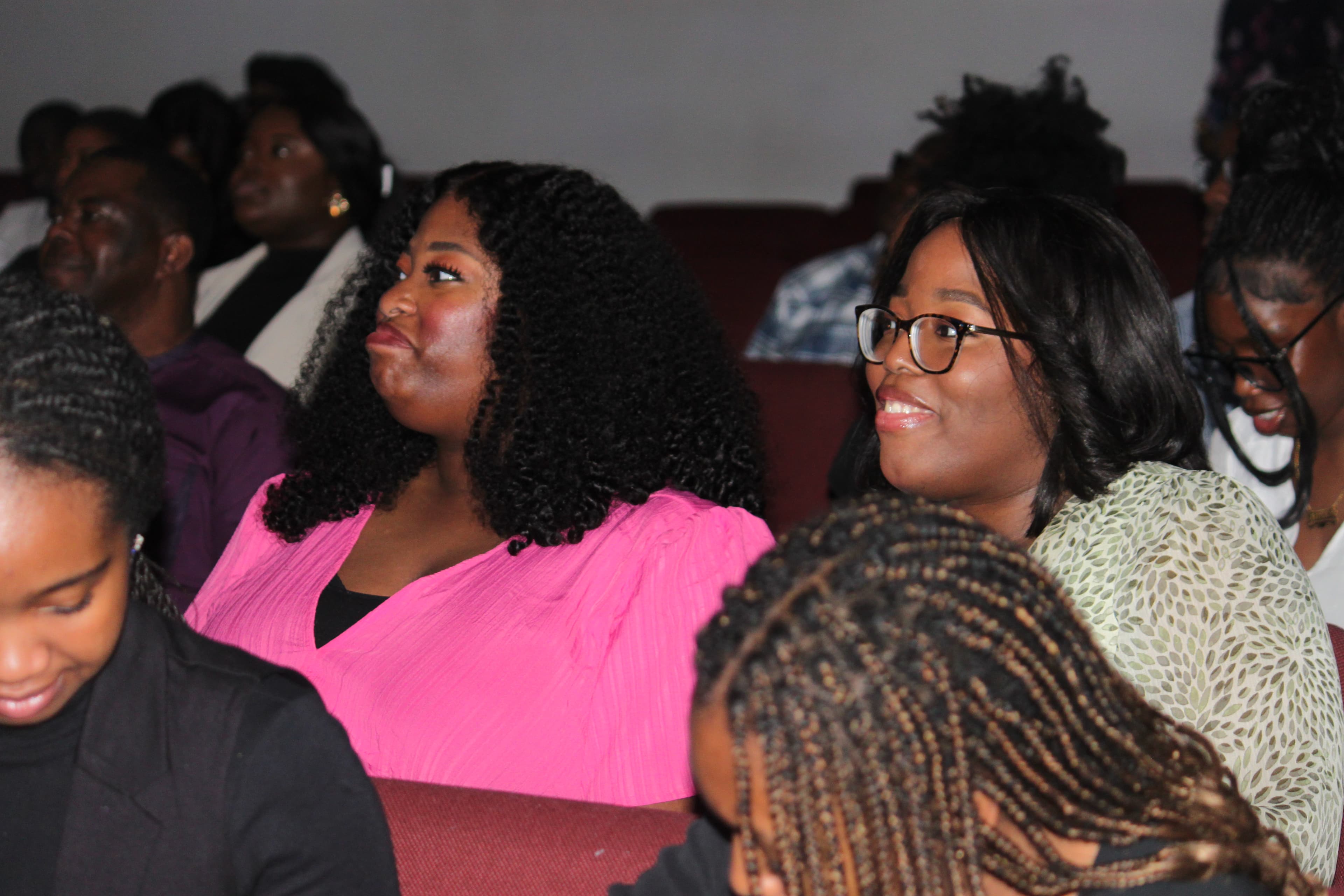 Young adults engaged during service at Shiloh Mega Parish